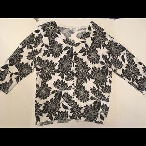 Gently used 3/4 sleeved Dress Barn sweater.